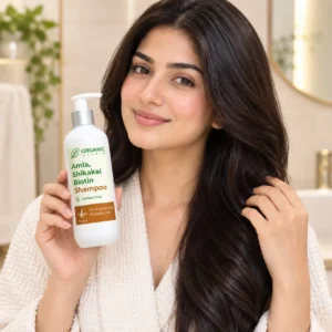 Woman applying Organic Studio Amla Shikakai Biotin Shampoo to wet hair